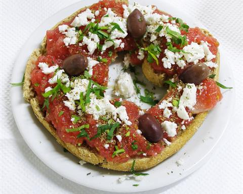 Illustrative photo: Cretan dakos: a barley rusk topped with grated tomato, feta, olives and oregano