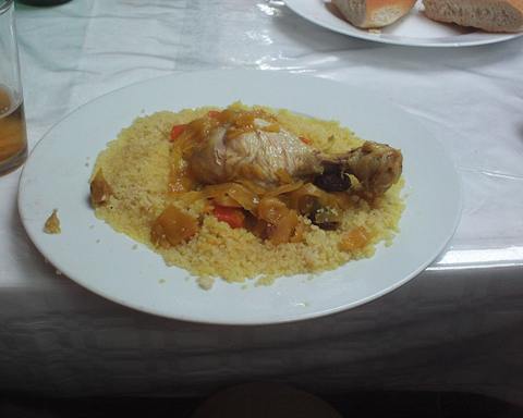 Illustrative photo: Chicken served on couscous on a white plate